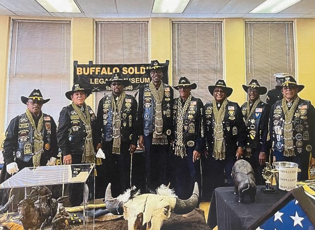 Members at the Buffalo Soldiers Legacy Museum exhibit